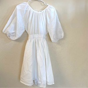 Adorable elbow length puff sleeved baby doll dress